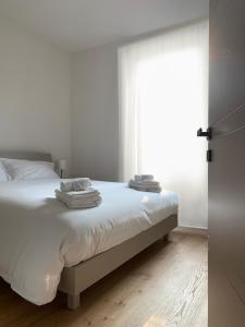 Letto o letti in una camera di Spazio Perlasca Apt 2 - Cernobbio Como Lake