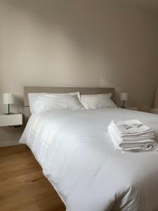 Letto o letti in una camera di Spazio Perlasca Apt 2 - Cernobbio Como Lake