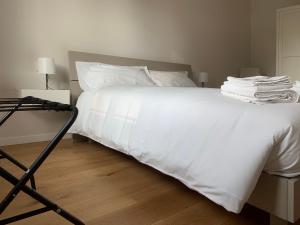 Letto o letti in una camera di Spazio Perlasca Apt 2 - Cernobbio Como Lake