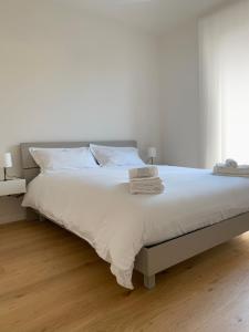 Letto o letti in una camera di Spazio Perlasca Apt 2 - Cernobbio Como Lake