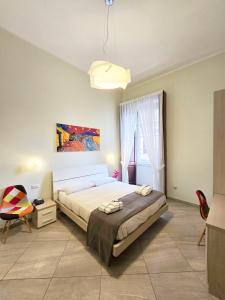 A bed or beds in a room at Maison Carolina