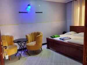 Postel nebo postele na pokoji v ubytování M3 Stella Hotel