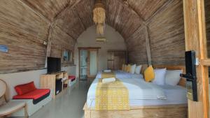 TV a/nebo společenská místnost v ubytování Daghan Cottage Nusa Penida
