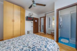 Letto o letti in una camera di TiglioExperienceComo