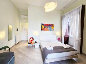 A bed or beds in a room at Maison Carolina