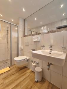 Kúpeľňa v ubytovaní Hotel Stolz