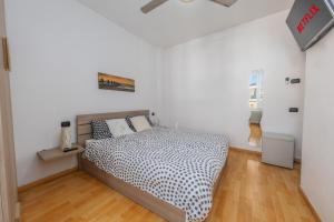 Letto o letti in una camera di TiglioExperienceComo
