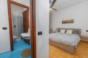 Letto o letti in una camera di TiglioExperienceComo