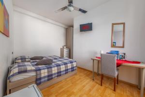 Letto o letti in una camera di TiglioExperienceComo