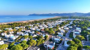an aerial view of a city next to the ocean at Cozy Beach Apartment - 296 in Durrës +31 photos