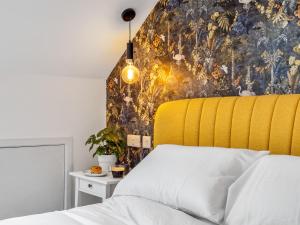 Llit o llits en una habitació de Garrai Locha Cottage