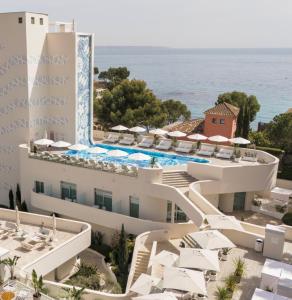 an aerial view of the hotel and the ocean at The Donna Portals in Portals Nous