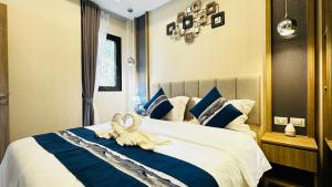 Postel nebo postele na pokoji v ubytování 芭提雅市中心别墅 + 36 fotografií