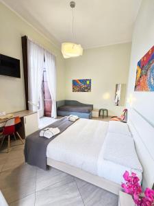 A bed or beds in a room at Maison Carolina