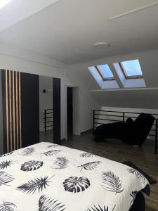 Ένα ή περισσότερα κρεβάτια σε δωμάτιο στο Central Duplex Apartment