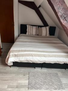 Postel nebo postele na pokoji v ubytování Engy