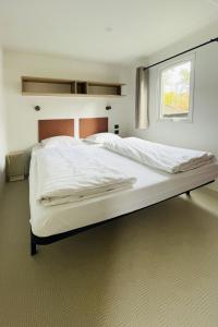 Postel nebo postele na pokoji v ubytování Holiday Home De Brenkberg-1 by Interhome + 12 fotografií