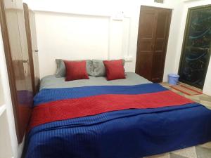 Postel nebo postele na pokoji v ubytování Ramaya Homestay