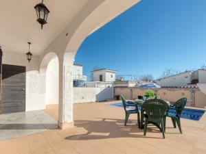 Balkón alebo terasa v ubytovaní Holiday Home Cala by Interhome