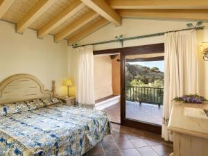 Katil atau katil-katil dalam bilik di Apartment Il Giardino degli Oleandri-2 by Interhome +23 gambar