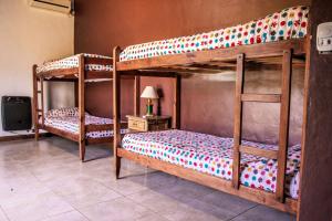a bedroom with two bunk beds and a tv at Casa Quinta Matilda Gon in Chascomús +58 photos