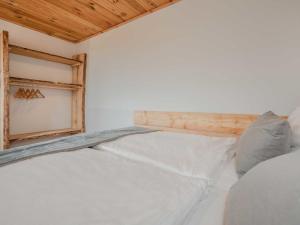 Postel nebo postele na pokoji v ubytování Dünenblick 1