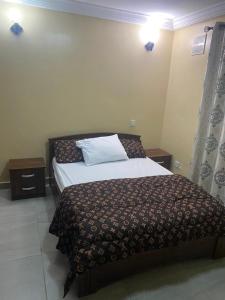 Postel nebo postele na pokoji v ubytování Eli apartment Lets 1