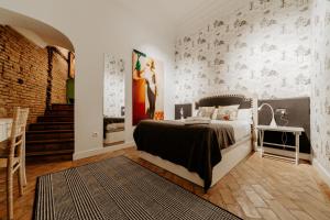 Posteľ alebo postele v izbe v ubytovaní Apartamento El Secreto de La Laurel