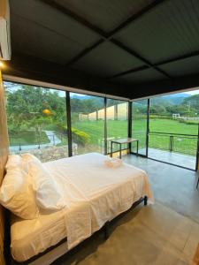 Postel nebo postele na pokoji v ubytování Finca Termópilas Rivera Huila RNT-92367