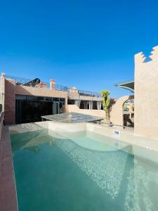 Bazén v ubytování Riad Ksar Al Amal & Spa nebo v jeho okolí
