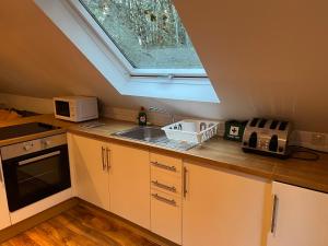 Køkken eller tekøkken på Sportsmans Cottage + 15 billeder