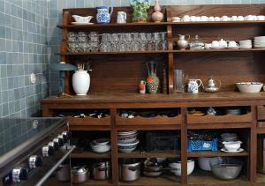 Cuisine ou kitchenette dans l'établissement L'Auberge 91530