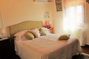 Voodi või voodid majutusasutuse Agriturismo Poggio de Papi toas