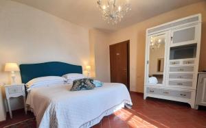 Voodi või voodid majutusasutuse Agriturismo Poggio de Papi toas