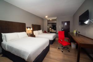 Postel nebo postele na pokoji v ubytování Four Points by Sheraton Saltillo