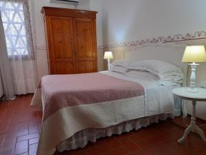 Voodi või voodid majutusasutuse Agriturismo Poggio de Papi toas