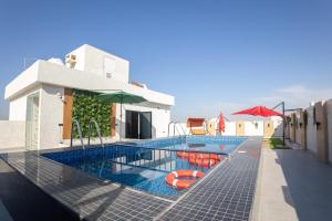 Bazén v ubytování فندق تارا بلس Tara Plus Hotel nebo v jeho okolí