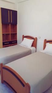 Postel nebo postele na pokoji v ubytování Family Vacation Home + 13 fotografií