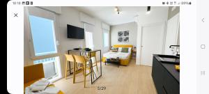 TV a/nebo společenská místnost v ubytování Bagatela suites and flat, Suite Scorcio Laguna