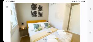 Postel nebo postele na pokoji v ubytování Bagatela suites and flat, Suite Scorcio Laguna