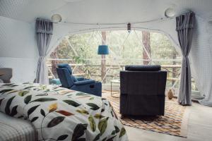 Postel nebo postele na pokoji v ubytování El Sendero Glamping