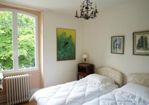 Un ou plusieurs lits dans un hébergement de l'établissement L'Auberge 91530