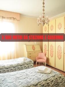 A bed or beds in a room at Affittacamere Umberto&Marisa