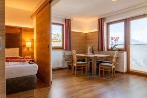 Postel nebo postele na pokoji v ubytování Aparthotel DAS Hochkönig