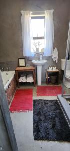 Зона вітальні в Pause Studio Room Yzerfontein