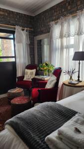 Ліжко або ліжка в номері Pause Studio Room Yzerfontein