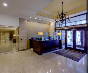 a lobby with a reception desk in a building at Urban Oasis 1-Bedroom Condo in Atlanta in Atlanta +9 photos