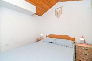 Posteľ alebo postele v izbe v ubytovaní House Small Robinson + 15 fotografií