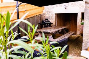 Posedenie v ubytovaní Gîte et SPA Chez Jules