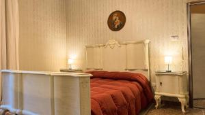 Una cama o camas en una habitación de Bel Fiore